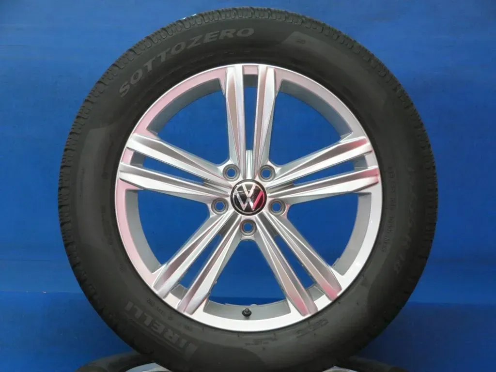 Original VW Tiguan VW Tiguan Allspace 18 Zoll Sebring Winterräder Alufelgen 5NA601025M Silber Winterreifen 4x 6,6 mm - Bild 1